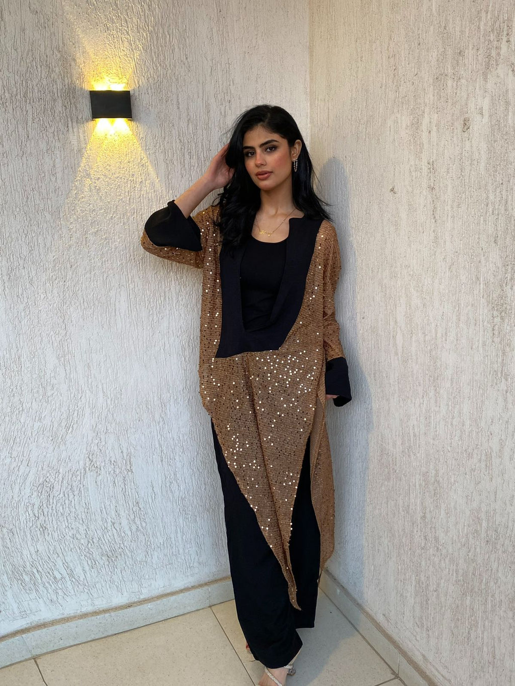 V set in gold